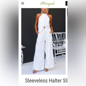 NWT. White 2 piece sleeveless. Size XL.